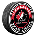 Hockey Canada IIHF Arrow Textured Hockey Puck product image 1, provided for visual reference and product detail review